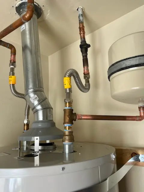 Water heater installation and plumbing repair in Belingham Square